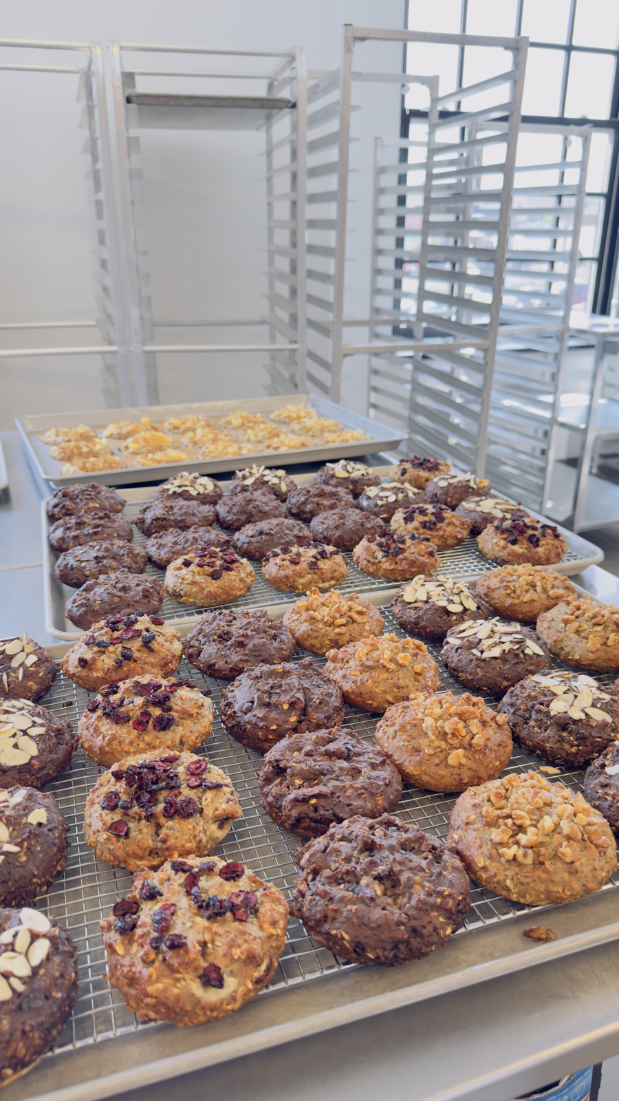 Racks of fresh-baked cookies cooling in the Omaha bakehouse