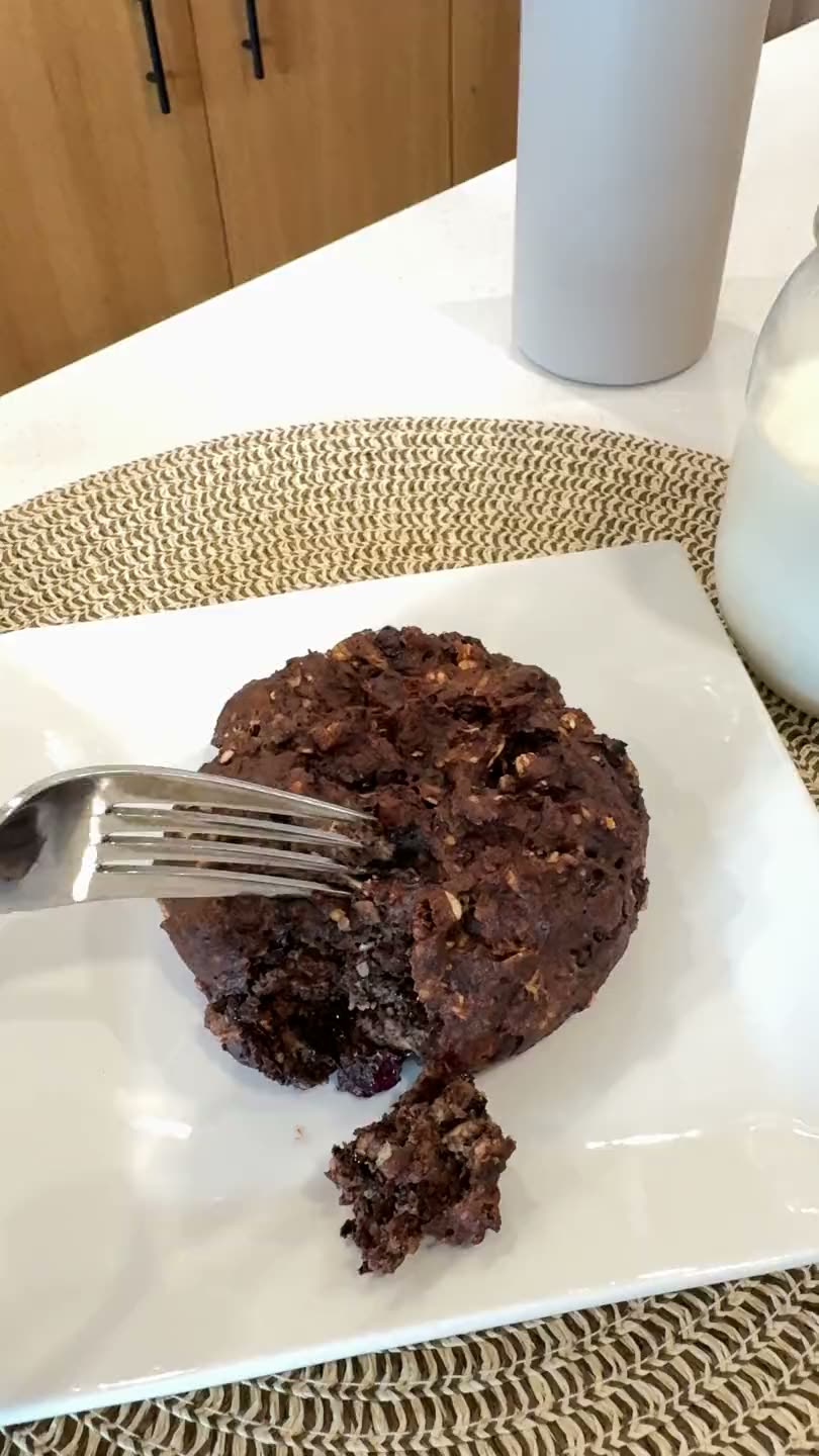 A fork pressing into a soft Cookie Not Cookie on a plate