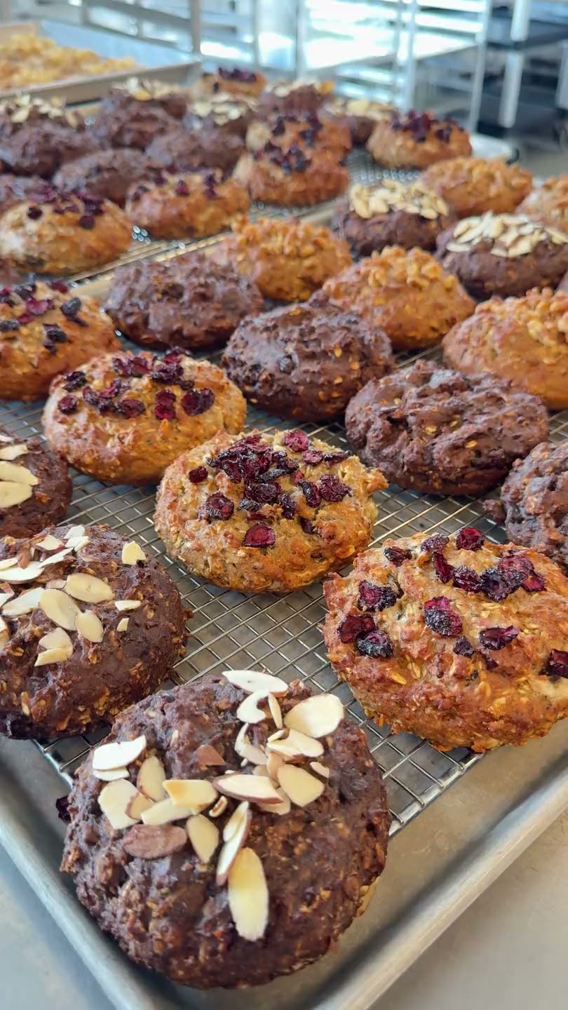 Fresh Cookie Not Cookie flavors cooling on bakery racks